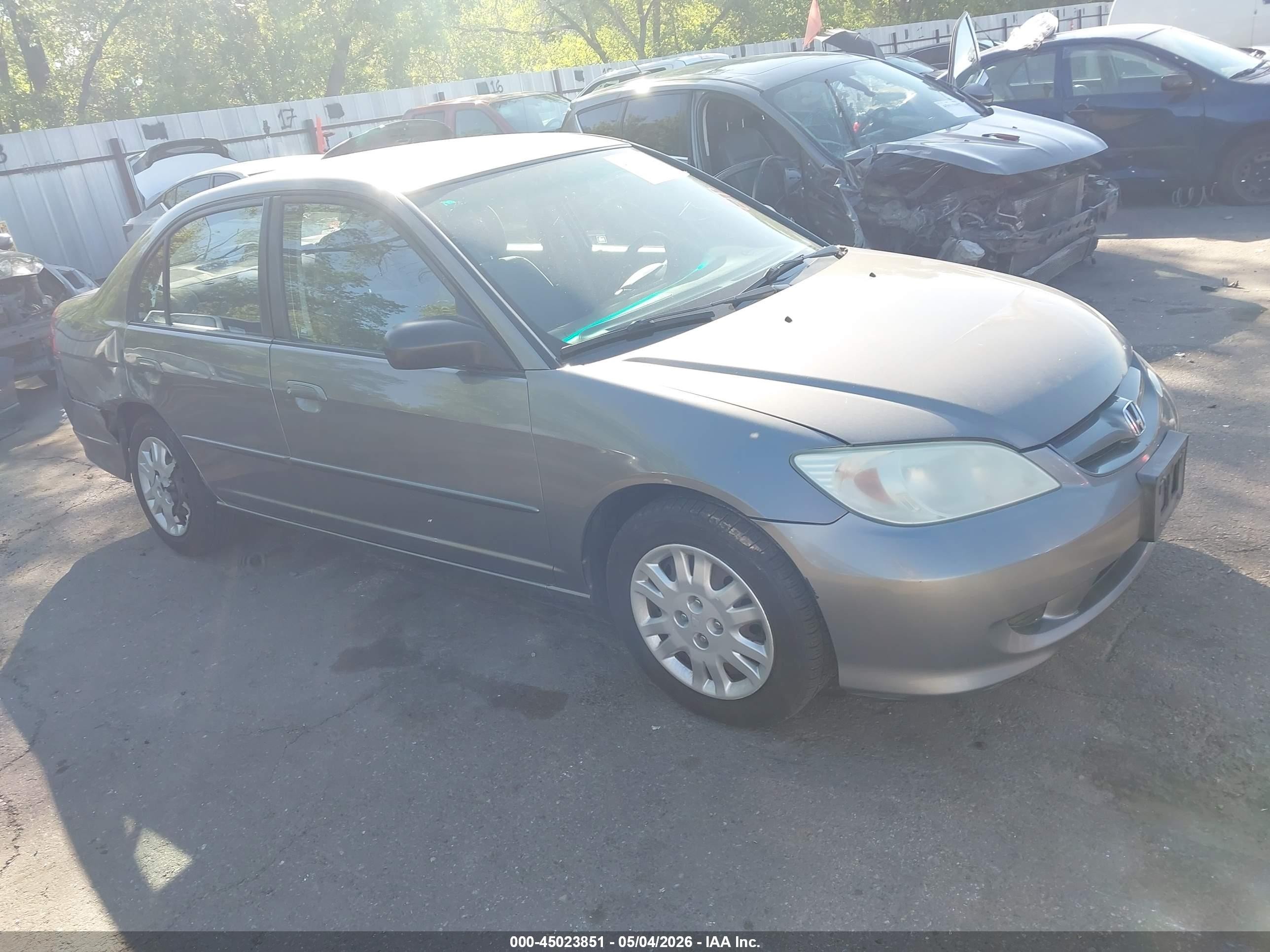 2004 Honda Civic Lx Silver vin: 1HGES16574L010135