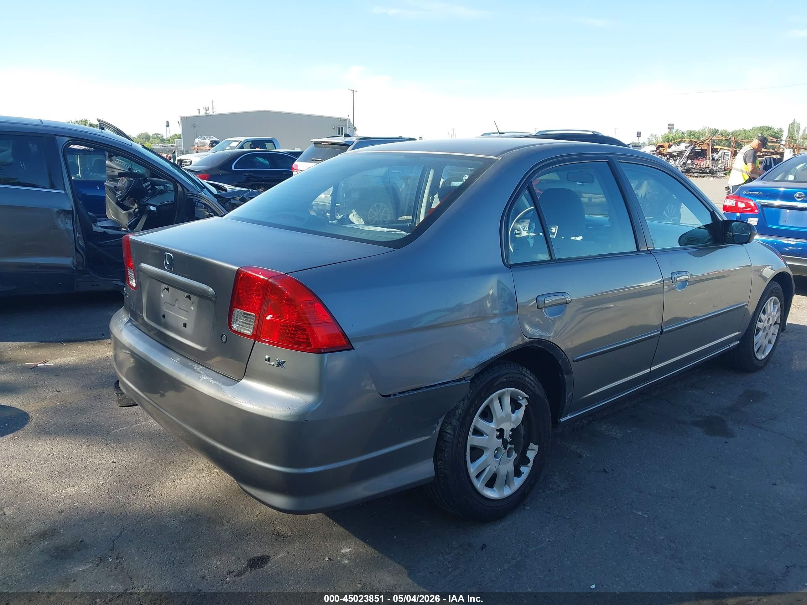 2004 Honda Civic Lx Silver vin: 1HGES16574L010135