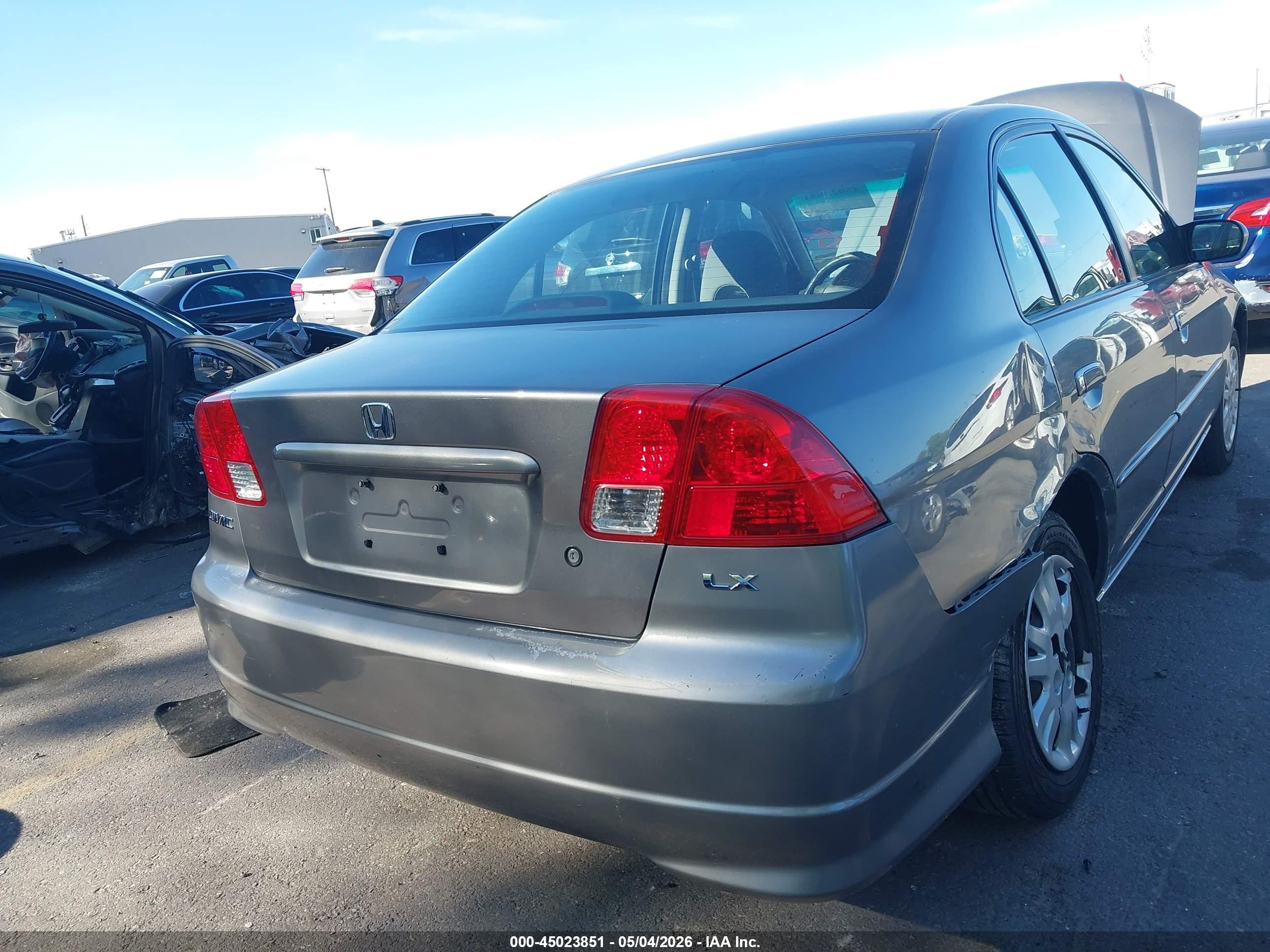2004 Honda Civic Lx Silver vin: 1HGES16574L010135
