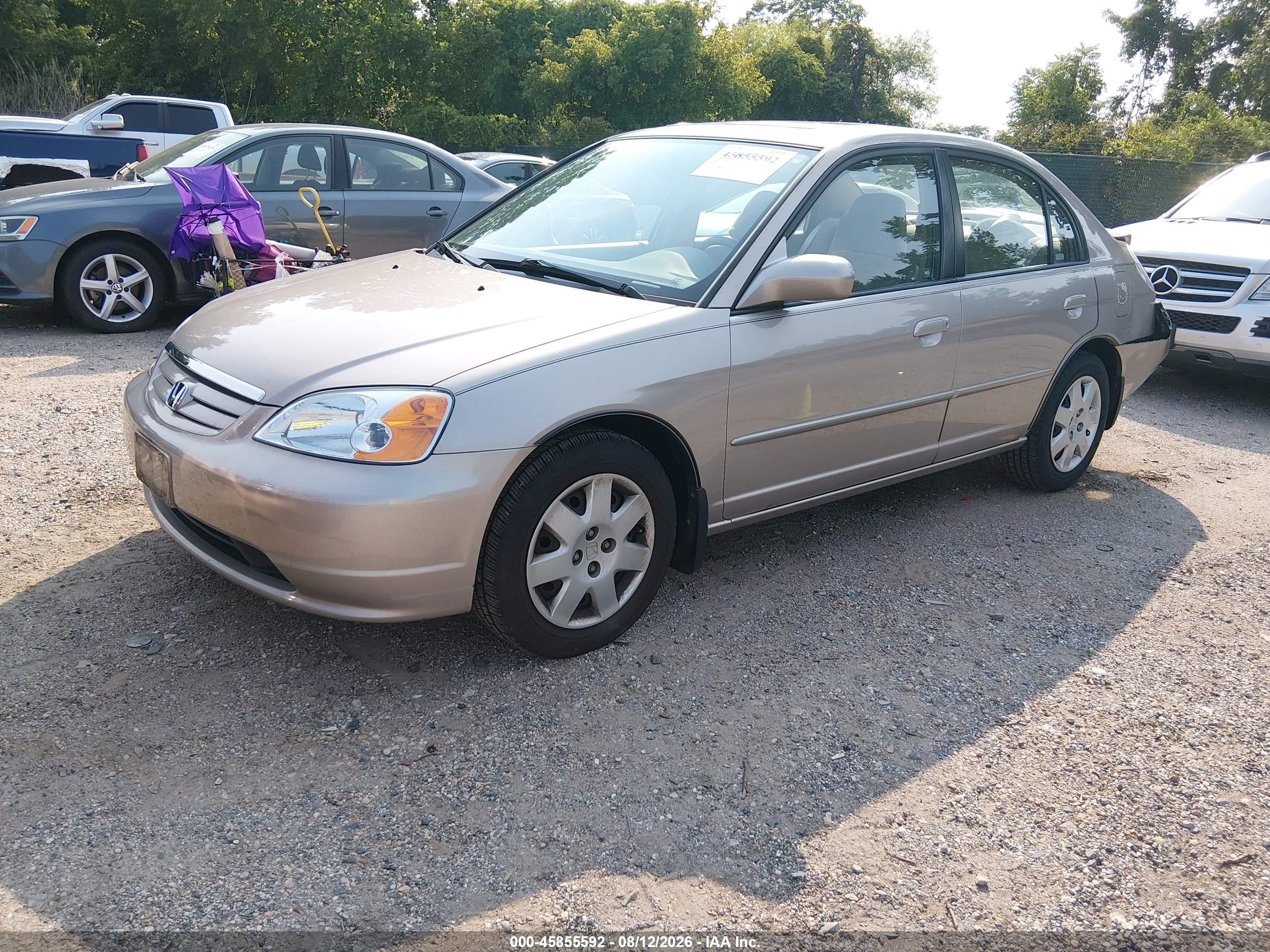 2002 Honda Civic Ex Gold vin: 1HGES268X2L071458