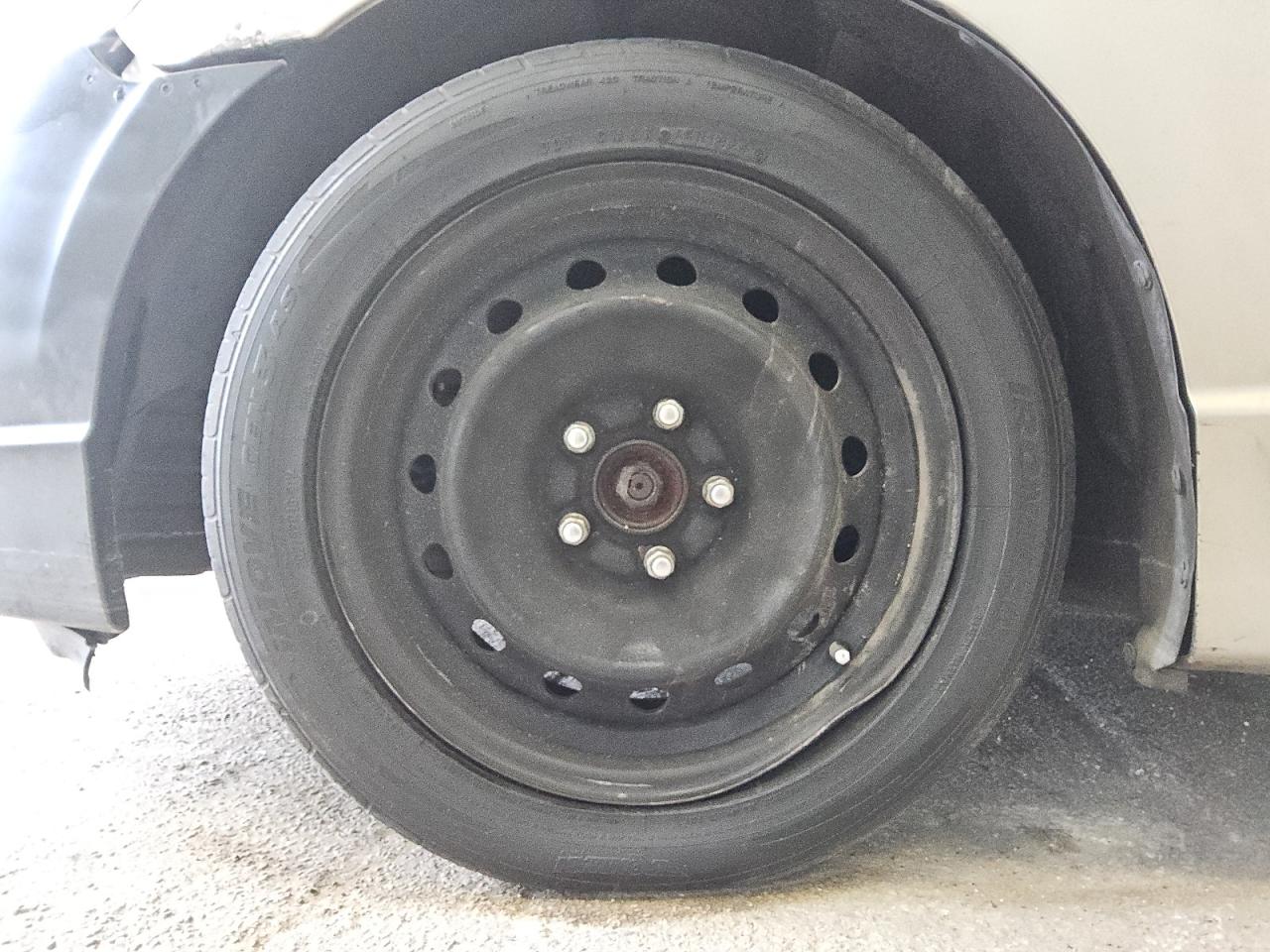 2006 Honda Civic Lx Tan vin: 1HGFA15556L092197 Damage: Left Front Wheel Cover, Missing, Replacement Required