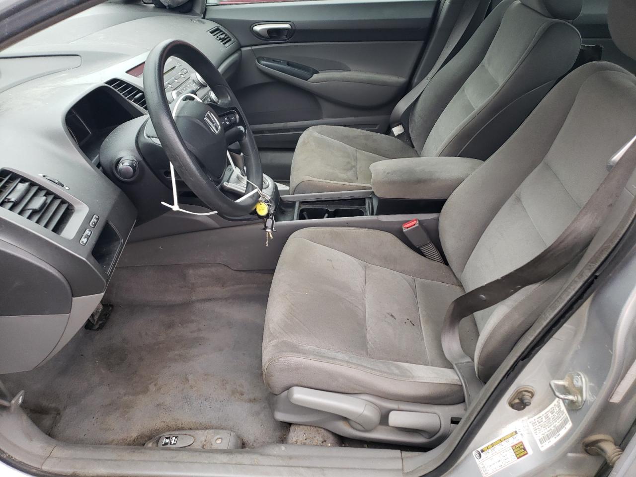 2006 Honda Civic Lx Silver vin: 1HGFA16546L116021 Damage: Left Front Seat, Stained, Permanent