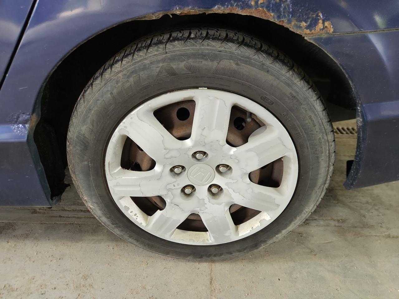 2006 Honda Civic Lx Blue vin: 1HGFA16556L004375 Damage: Left Rear Tire, Worn, Replacement Required