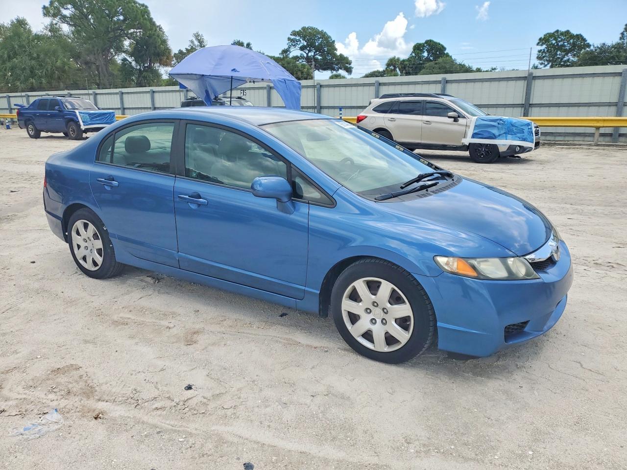 2009 Honda Civic Lx Blue vin: 1HGFA16569L010819