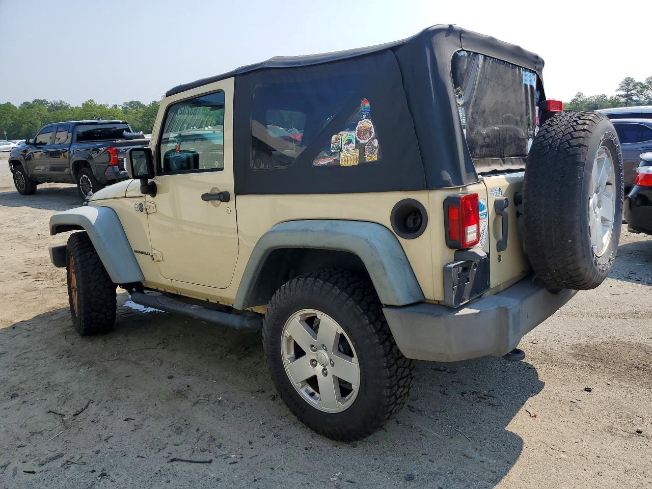 2011 Jeep Wrangler Sport Cream vin: 1J4AA2D17BL525312