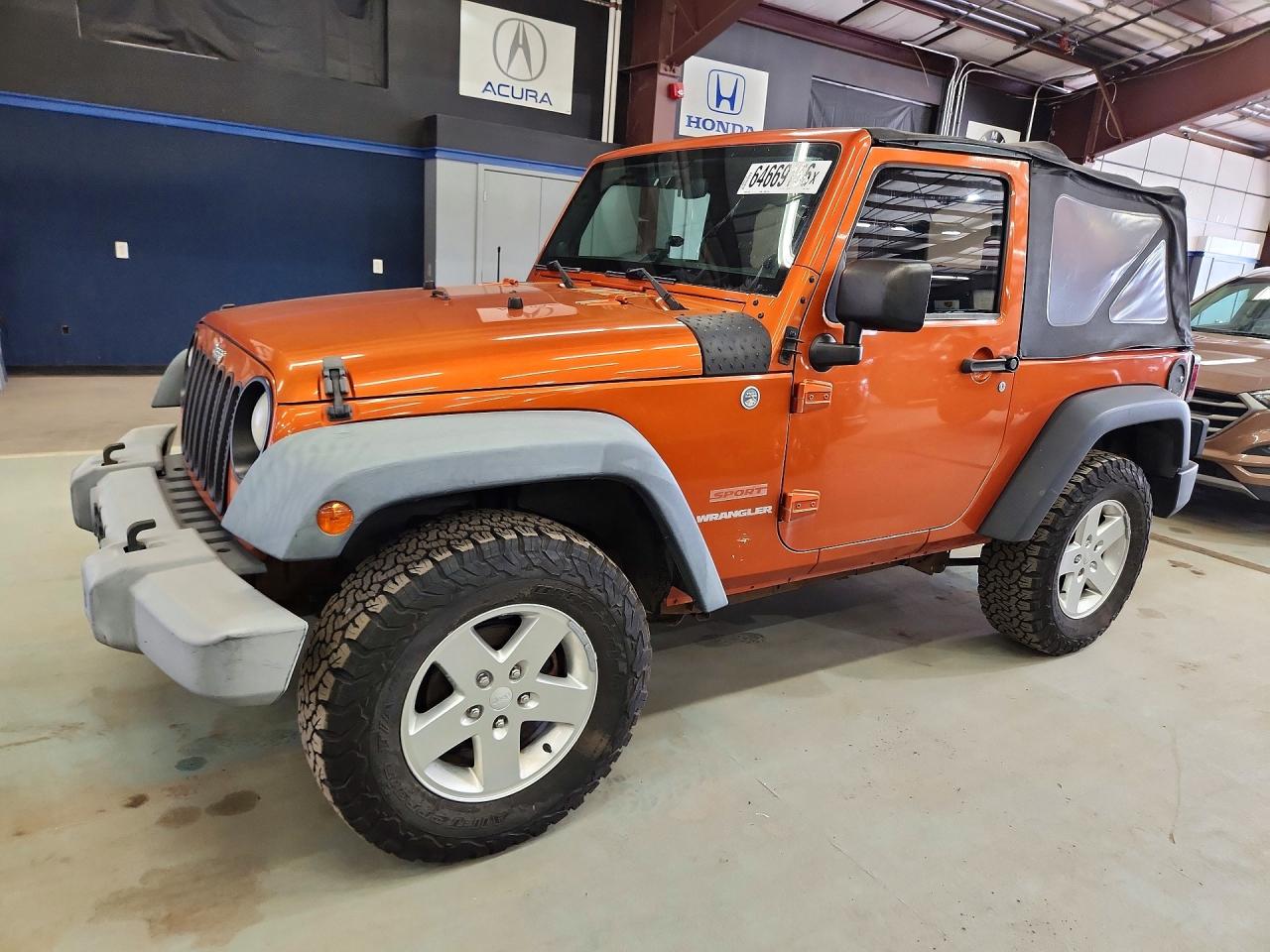 2011 Jeep Wrangler Sport Orange vin: 1J4AA2D18BL569142