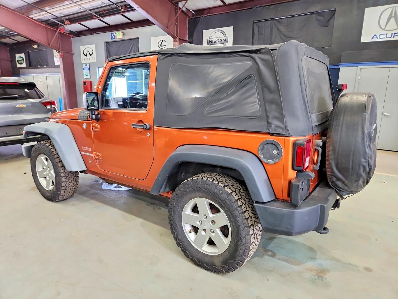 2011 Jeep Wrangler Sport Orange vin: 1J4AA2D18BL569142