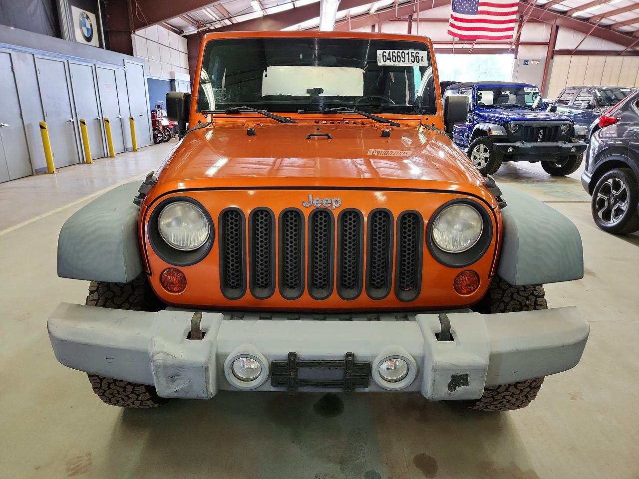 2011 Jeep Wrangler Sport Orange vin: 1J4AA2D18BL569142