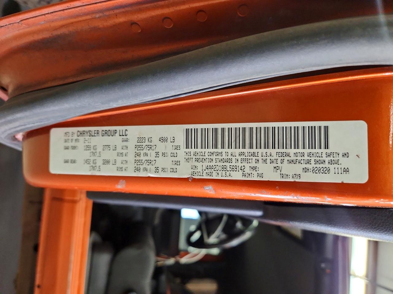 2011 Jeep Wrangler Sport Orange vin: 1J4AA2D18BL569142