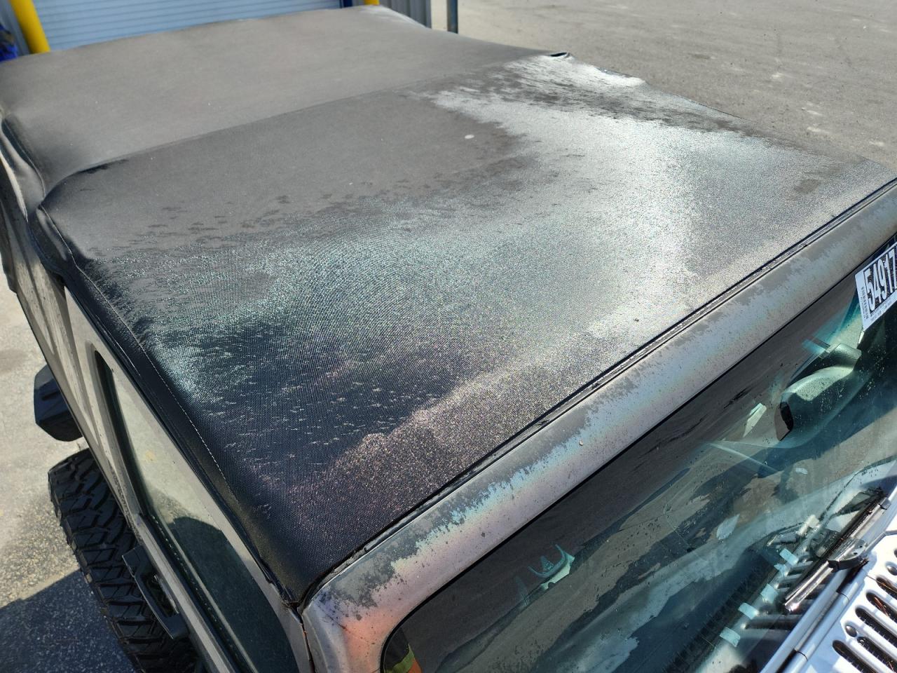 2011 Jeep Wrangler Sport Silver vin: 1J4AA2D1XBL505166 Damage: Front Roof Panel, Oxidized, > 12 Inches