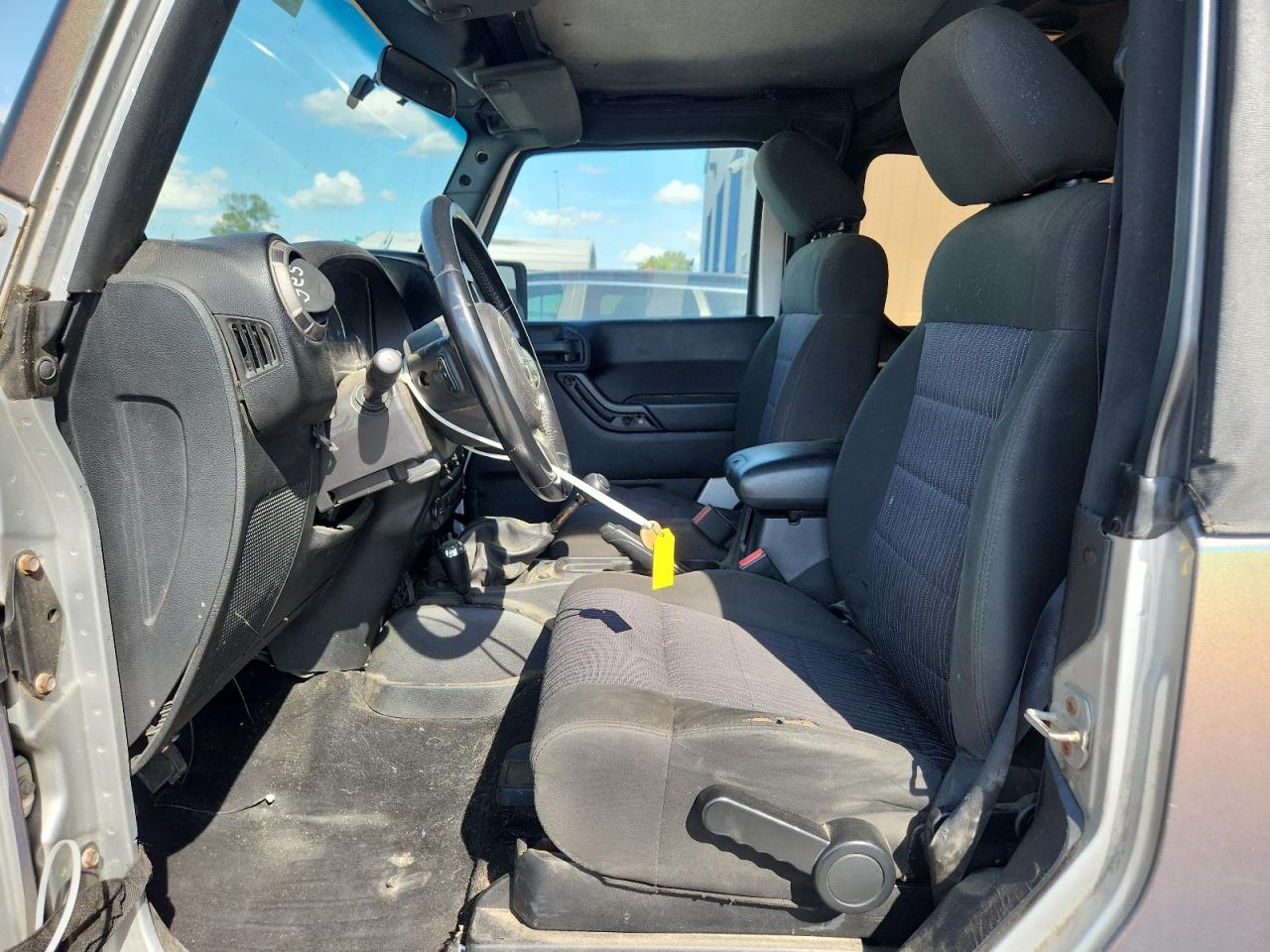 2011 Jeep Wrangler Sport Silver vin: 1J4AA2D1XBL505166 Damage: Left Front Seat Cushion, Torn, 4 To 5 Inches