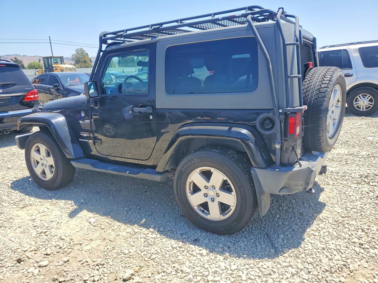 2010 Jeep Wrangler Sahara Black vin: 1J4AA5D11AL215818