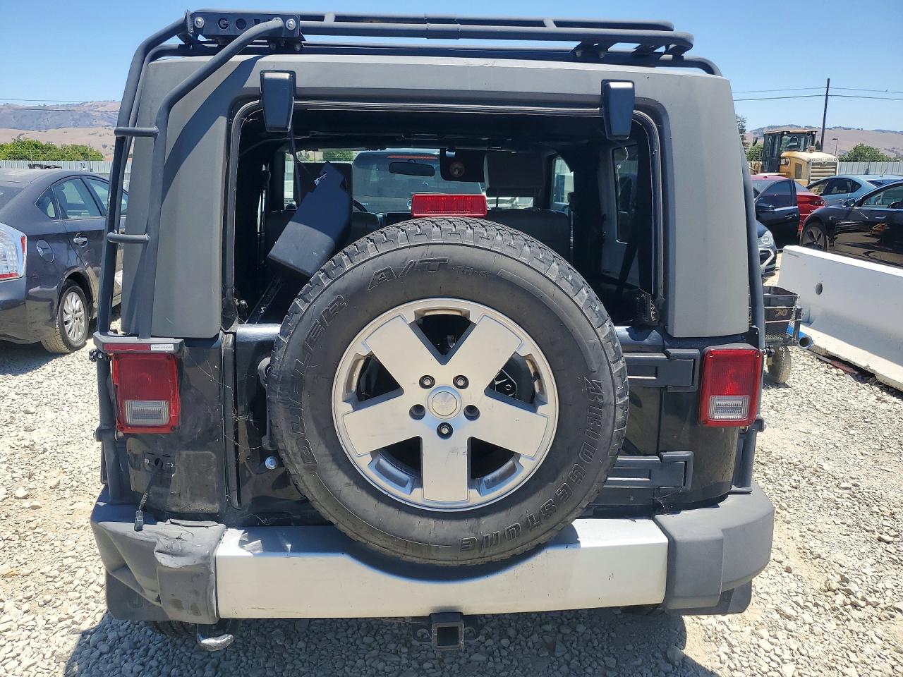 2010 Jeep Wrangler Sahara Black vin: 1J4AA5D11AL215818
