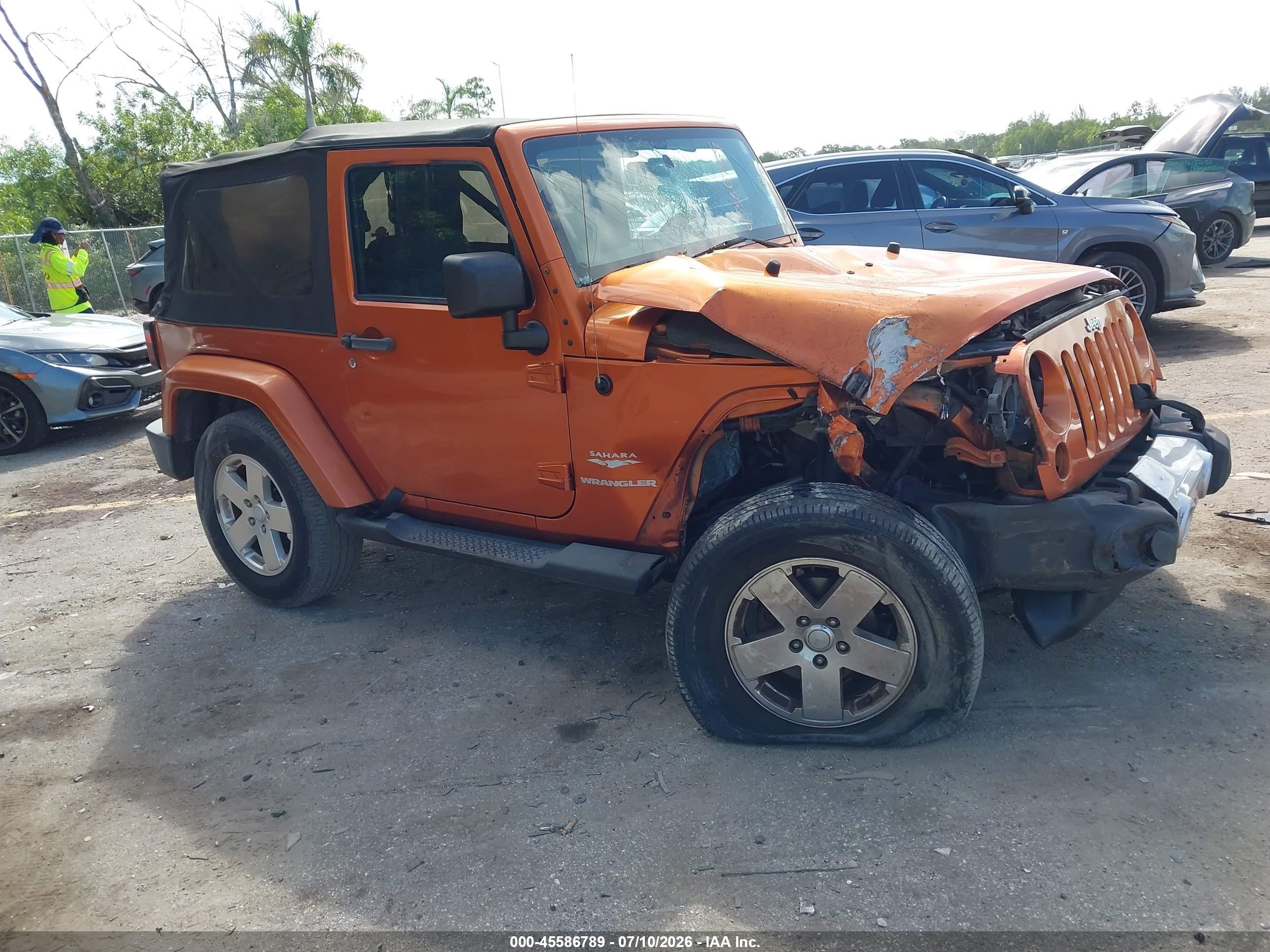 2011 Jeep Wrangler Sahara Orange vin: 1J4AA5D16BL606349