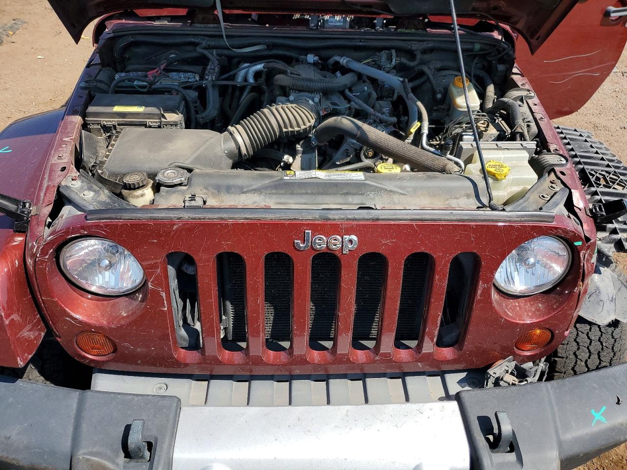 2010 Jeep Wrangler Sahara Maroon vin: 1J4AA5D17AL141224