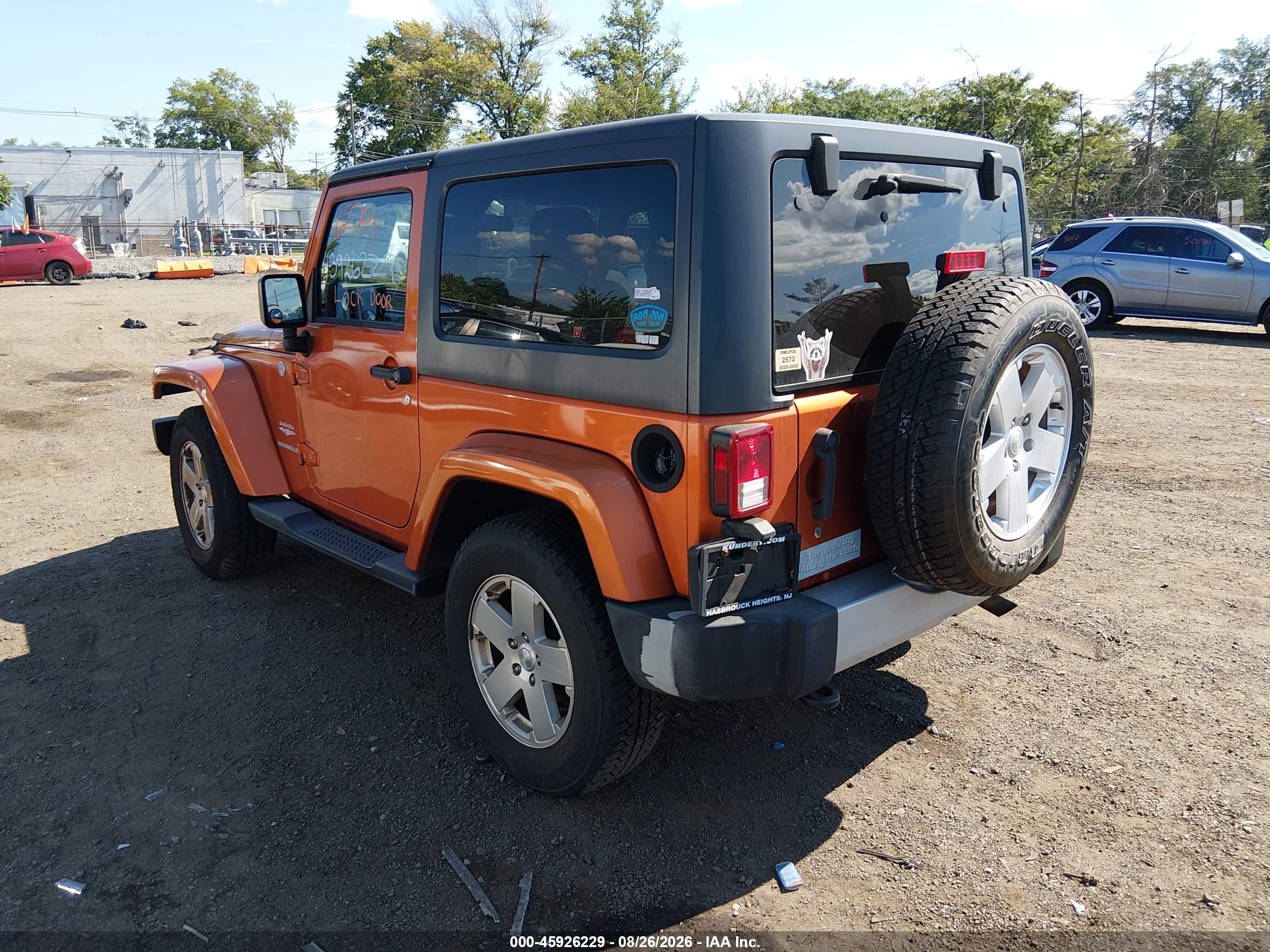 2011 Jeep Wrangler Sahara Orange vin: 1J4AA5D18BL502672