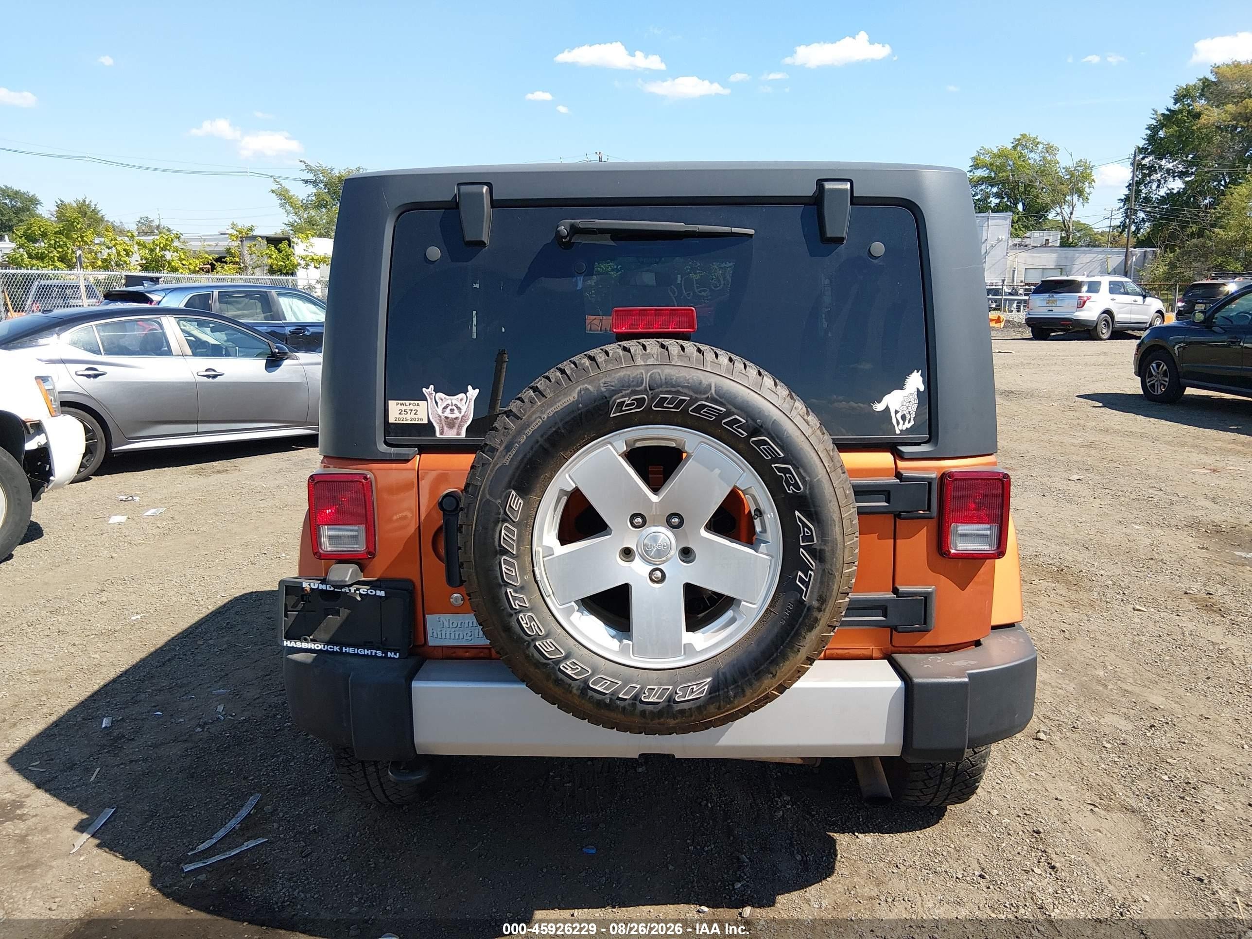 2011 Jeep Wrangler Sahara Orange vin: 1J4AA5D18BL502672