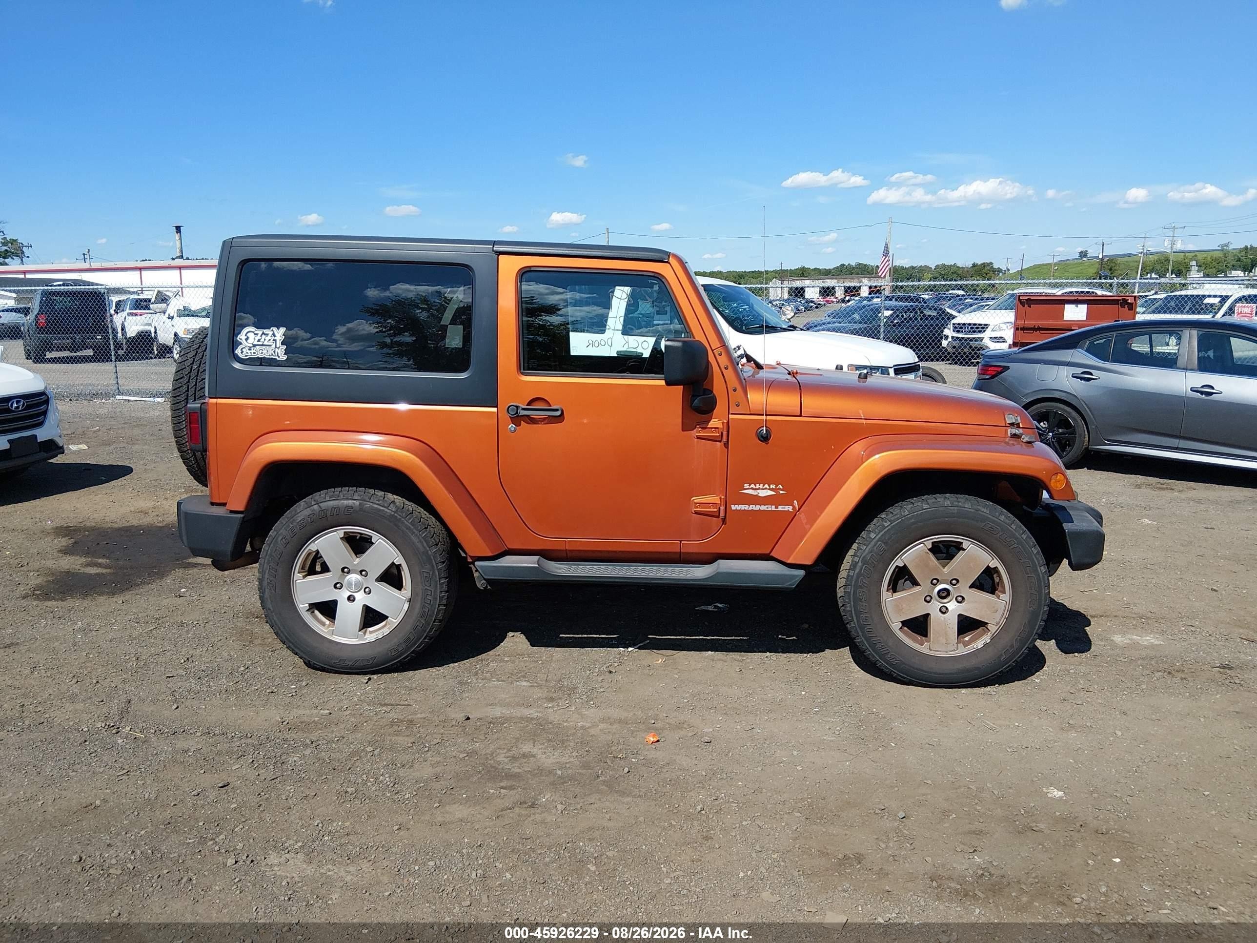 2011 Jeep Wrangler Sahara Orange vin: 1J4AA5D18BL502672