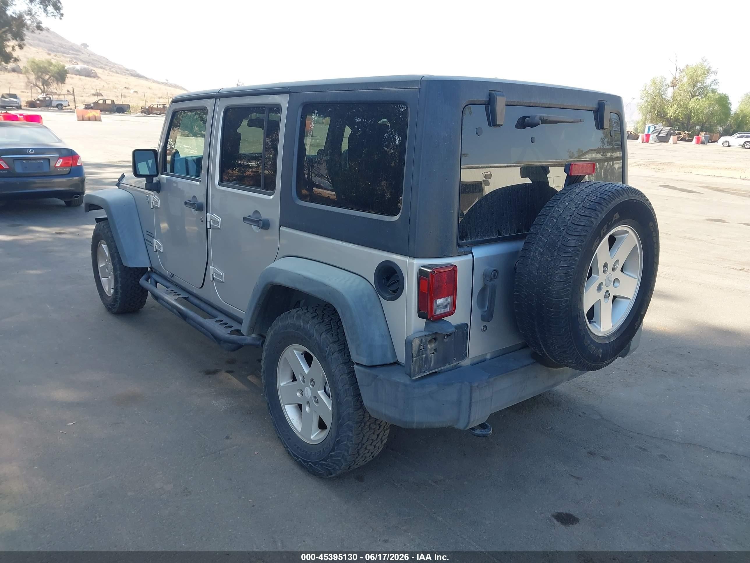 2011 Jeep Wrangler Unlimited Sport Silver vin: 1J4BA3H10BL519419