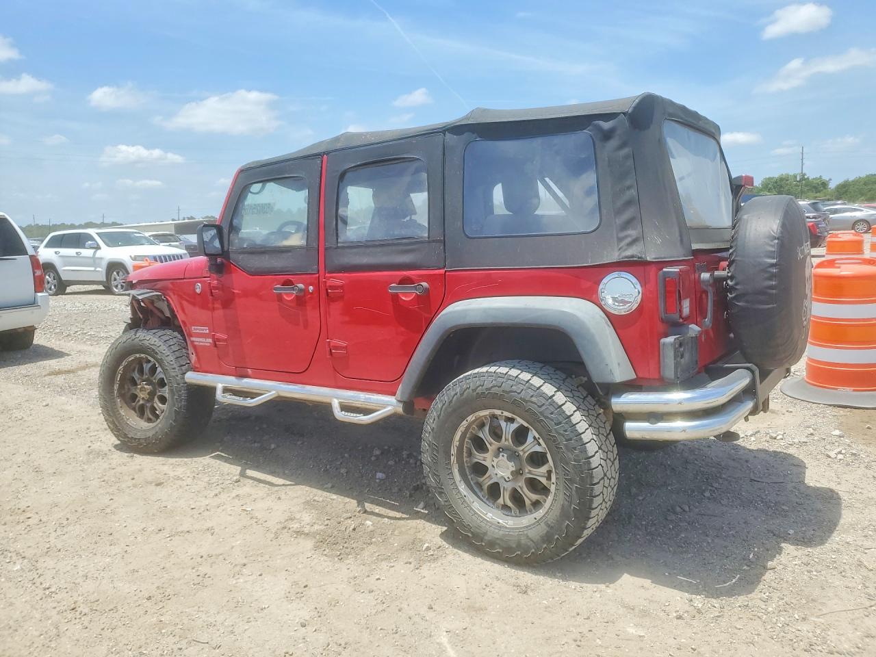 2010 Jeep Wrangler Unlimited Sport Red vin: 1J4BA3H14AL143614