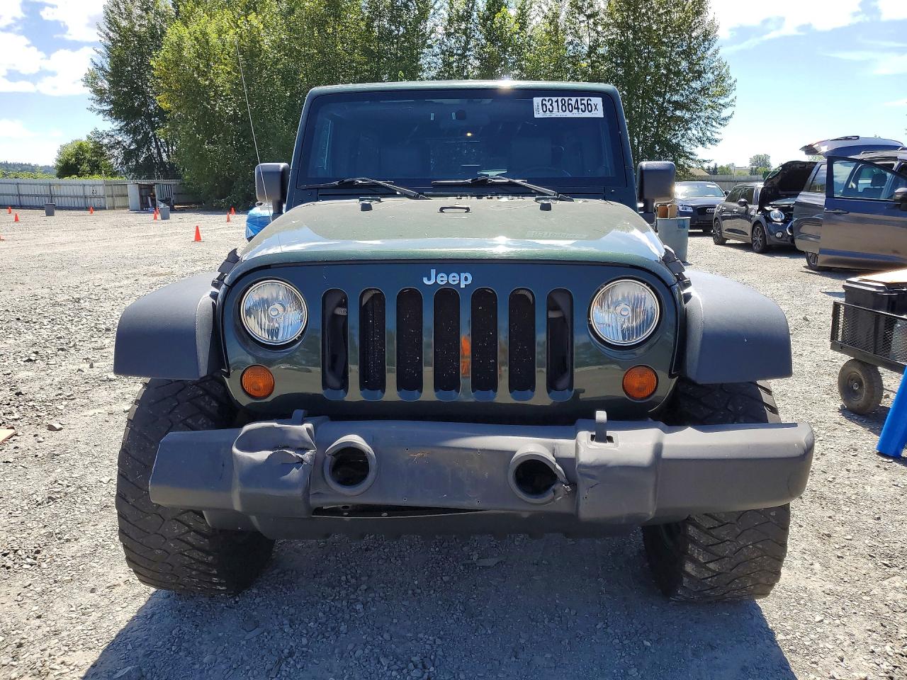2010 Jeep Wrangler Unlimited Sport Зеленый vin: 1J4BA3H14AL199116