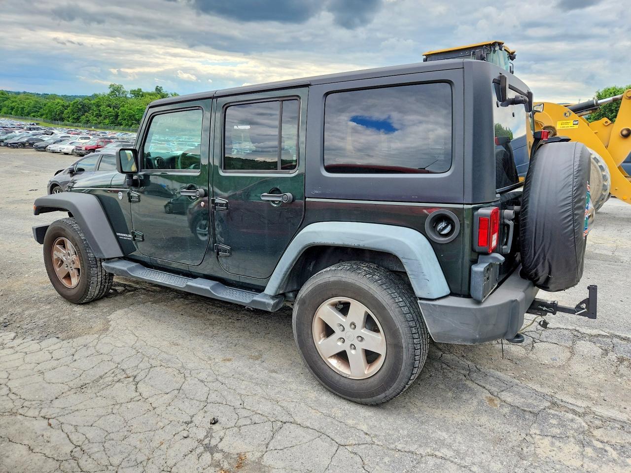 2011 Jeep Wrangler Unlimited Sport Зеленый vin: 1J4BA3H15BL510781