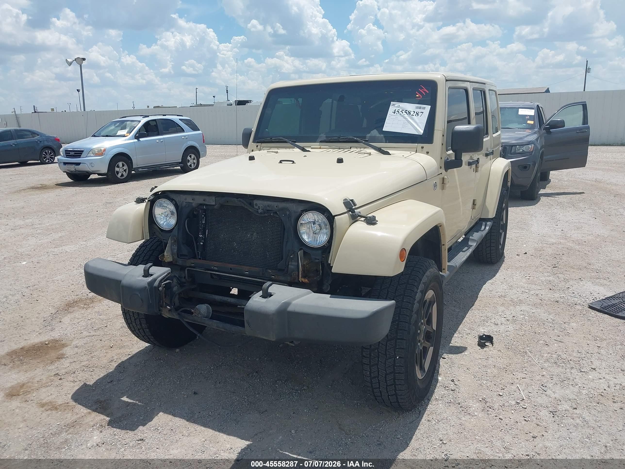 2011 Jeep Wrangler Unlimited Sport Tan vin: 1J4BA3H15BL625431