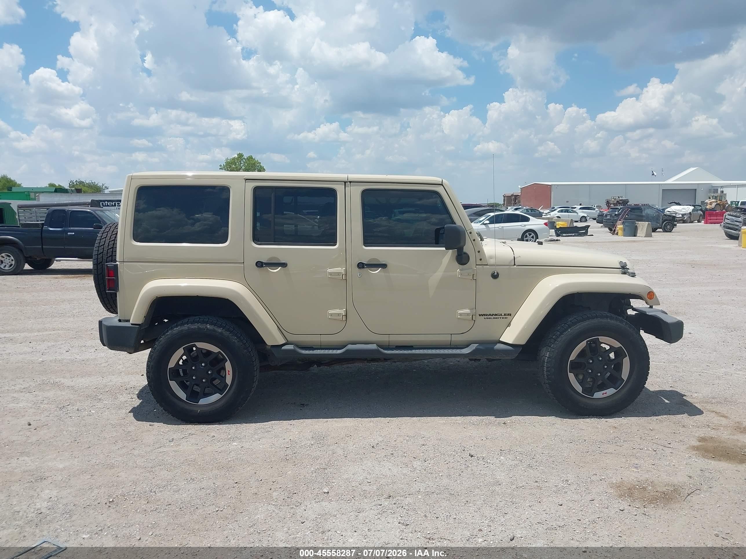 2011 Jeep Wrangler Unlimited Sport Tan vin: 1J4BA3H15BL625431