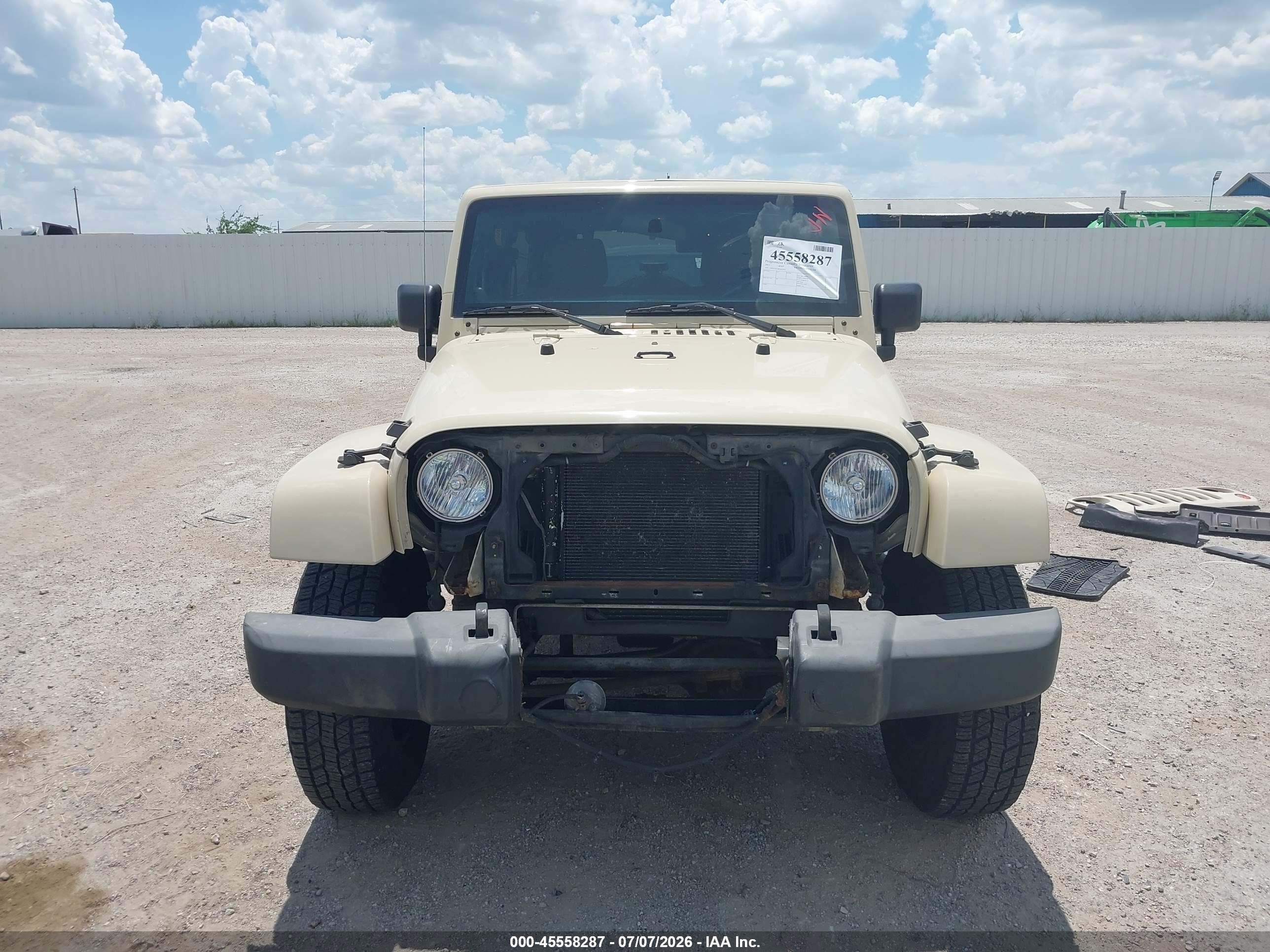 2011 Jeep Wrangler Unlimited Sport Tan vin: 1J4BA3H15BL625431