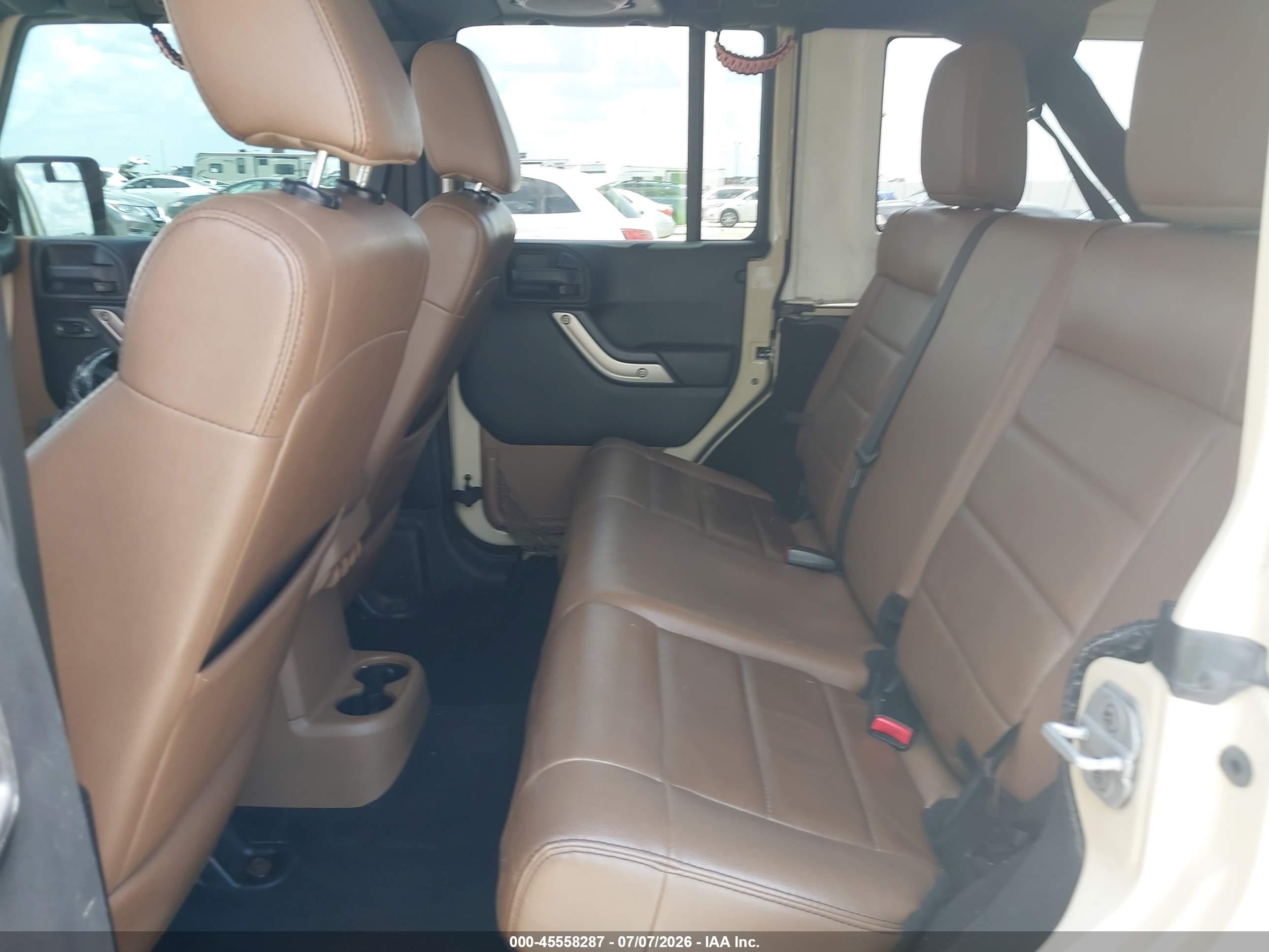 2011 Jeep Wrangler Unlimited Sport Tan vin: 1J4BA3H15BL625431