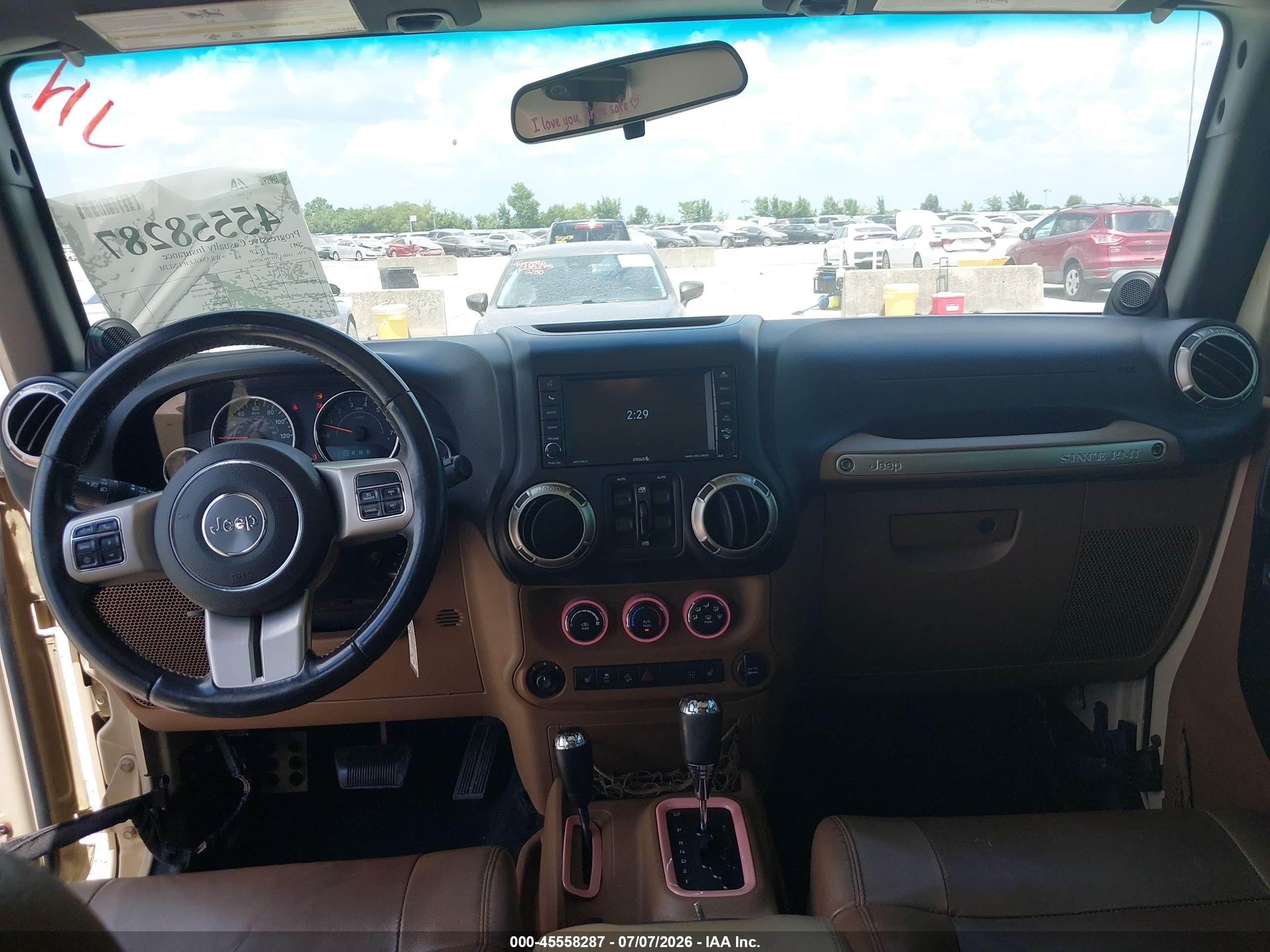 2011 Jeep Wrangler Unlimited Sport Tan vin: 1J4BA3H15BL625431