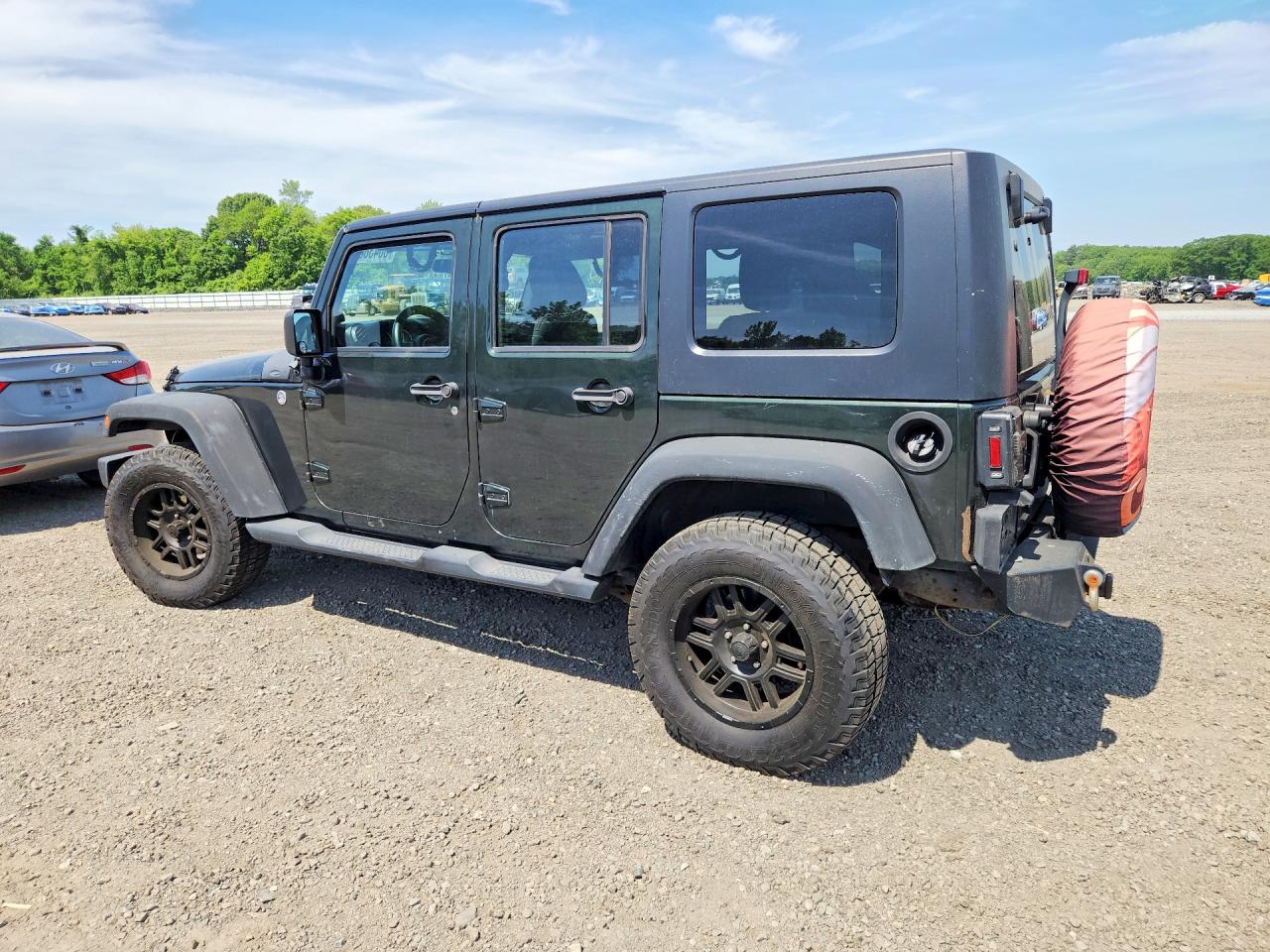 2011 Jeep Wrangler Unlimited Sport Green vin: 1J4BA3H17BL551297