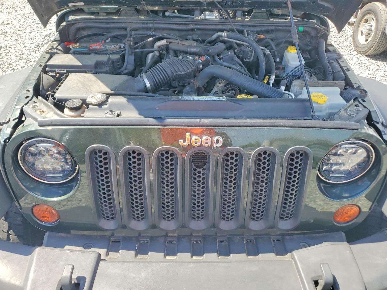 2011 Jeep Wrangler Unlimited Sport Green vin: 1J4BA3H18BL581943