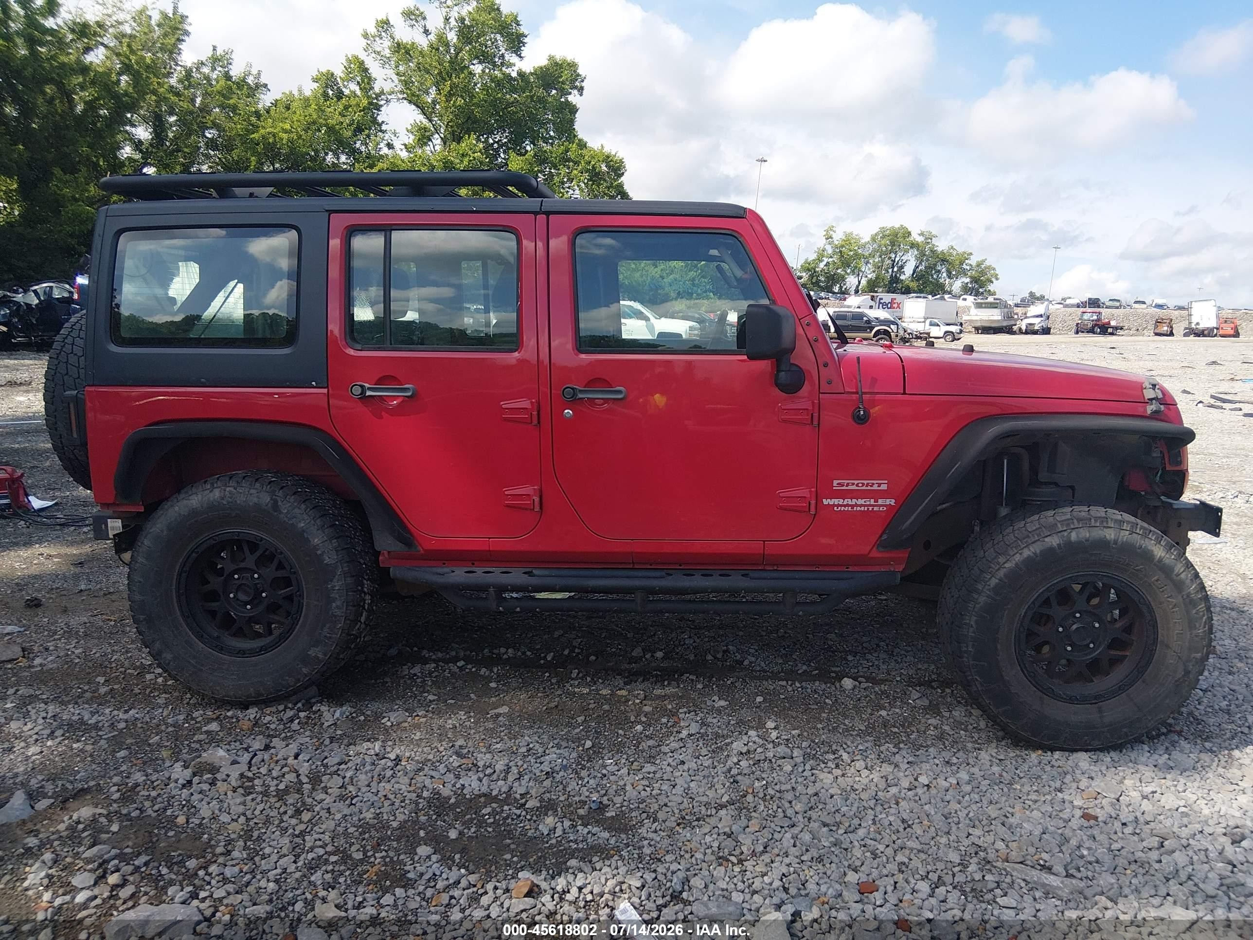 2011 Jeep Wrangler Unlimited Sport Red vin: 1J4BA3H1XBL623254