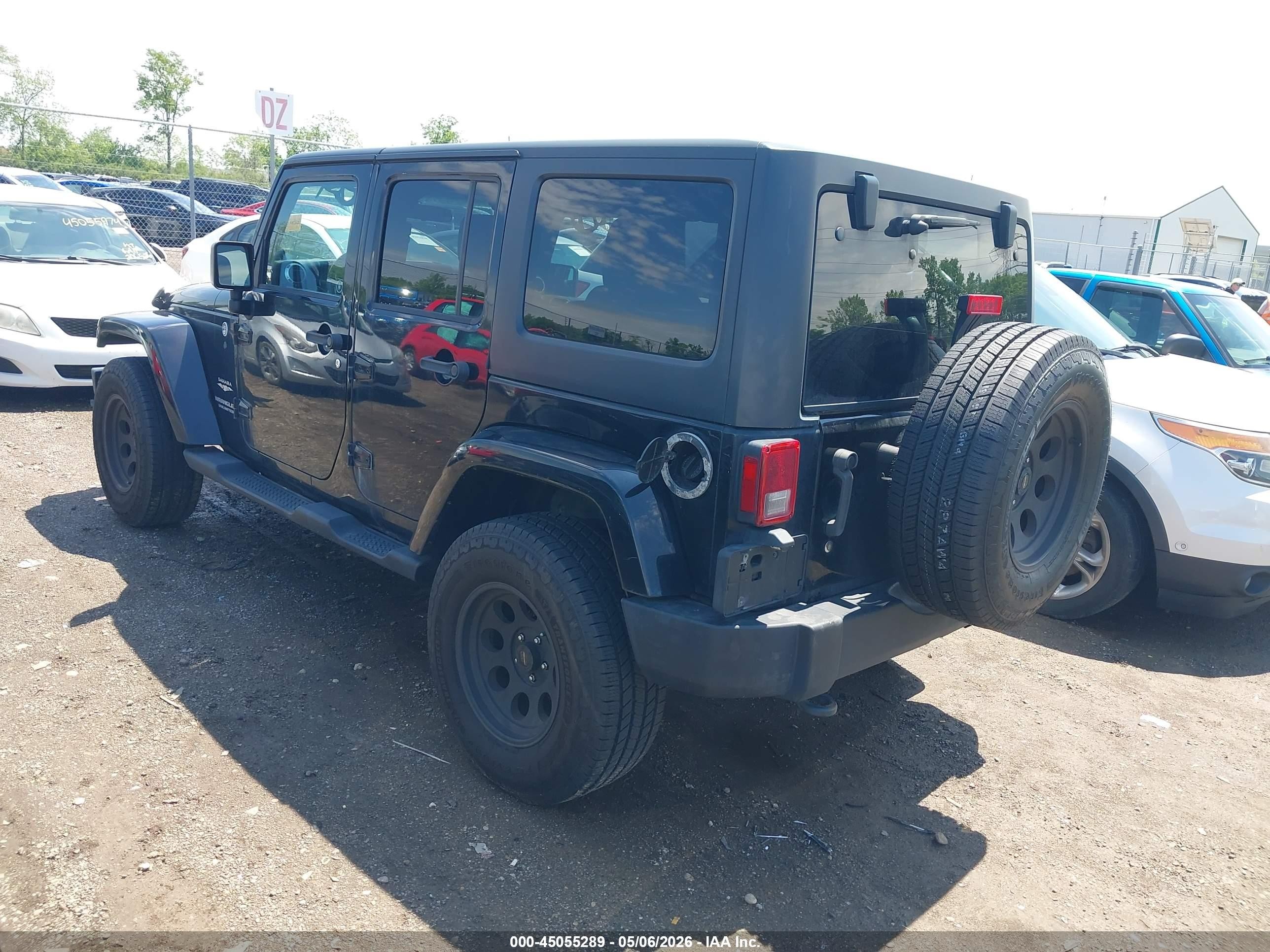 2011 Jeep Wrangler Unlimited Sahara Черный vin: 1J4BA5H10BL635392