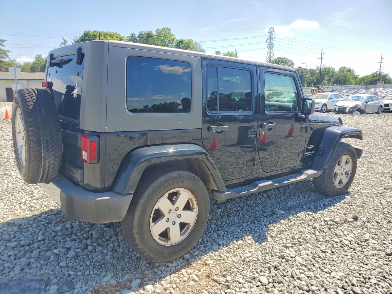 2010 Jeep Wrangler Unlimited Sahara Black vin: 1J4BA5H12AL140030