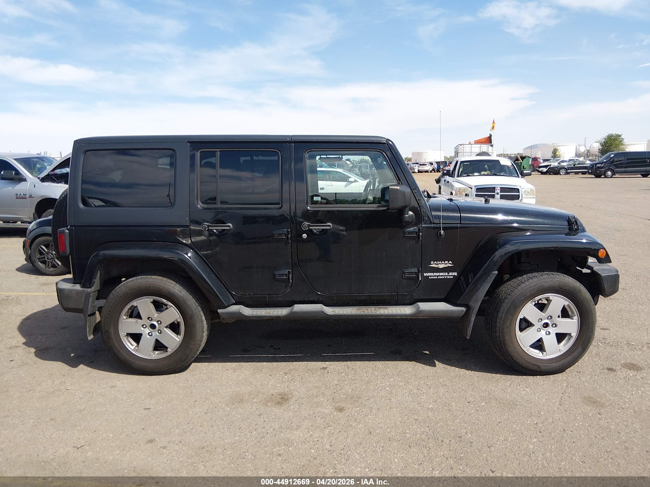 2011 Jeep Wrangler Unlimited Sahara Black vin: 1J4BA5H12BL522477