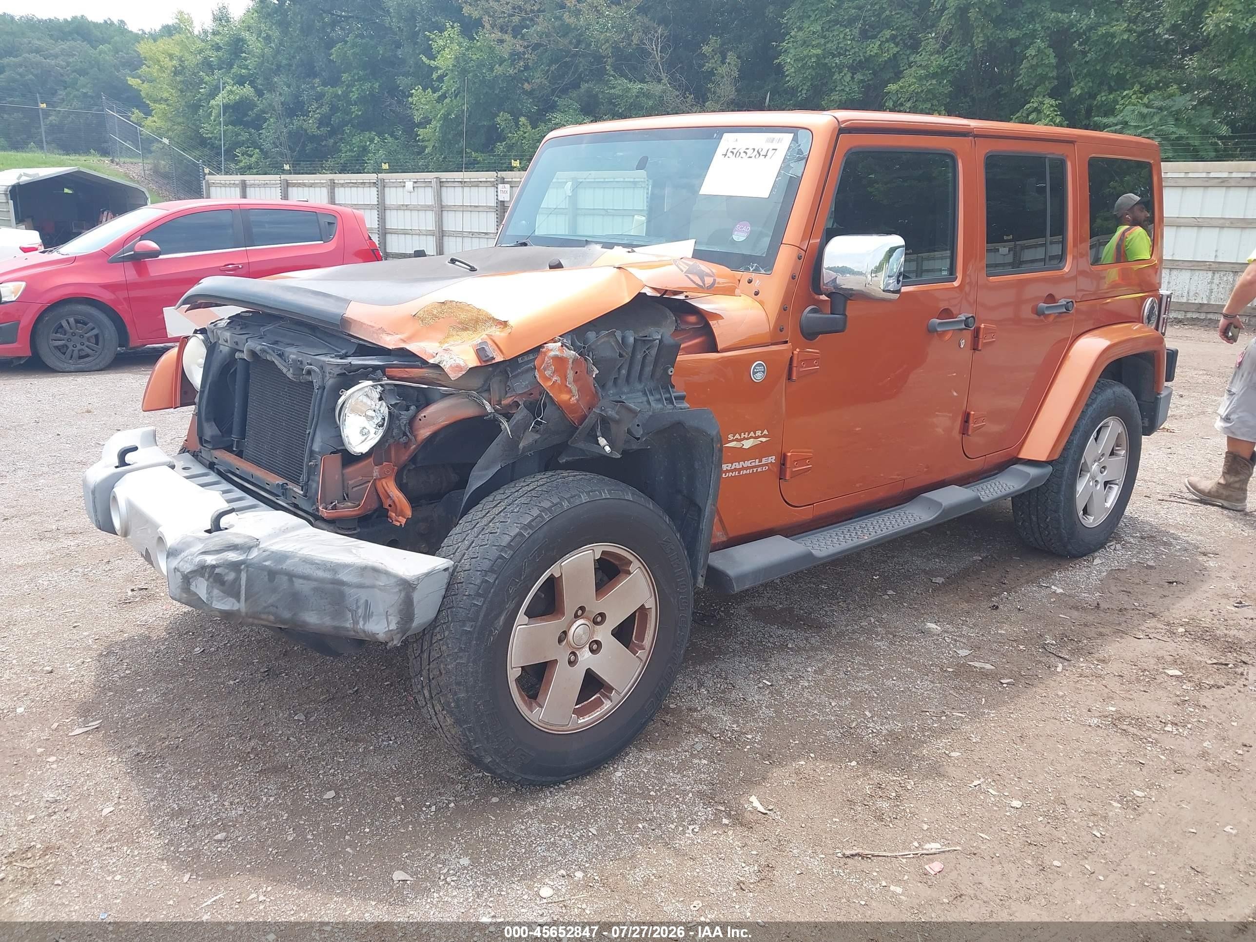 2011 Jeep Wrangler Unlimited Sahara Orange vin: 1J4BA5H12BL528537