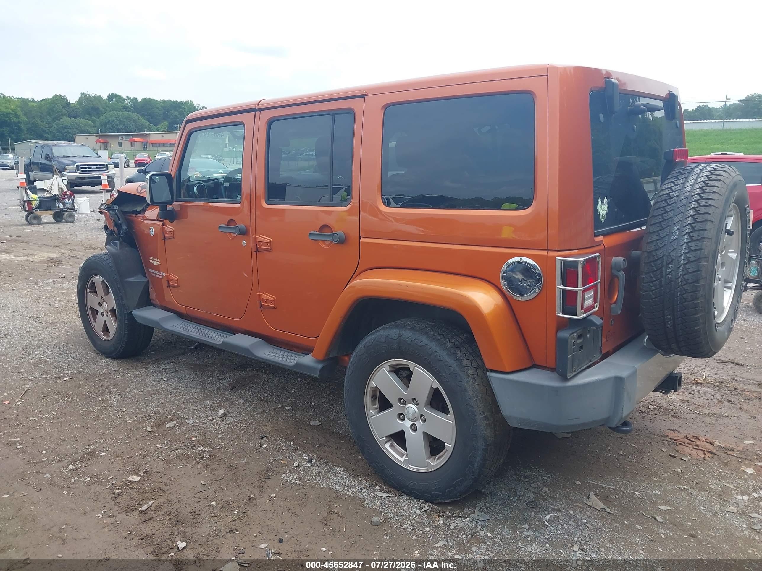 2011 Jeep Wrangler Unlimited Sahara Orange vin: 1J4BA5H12BL528537