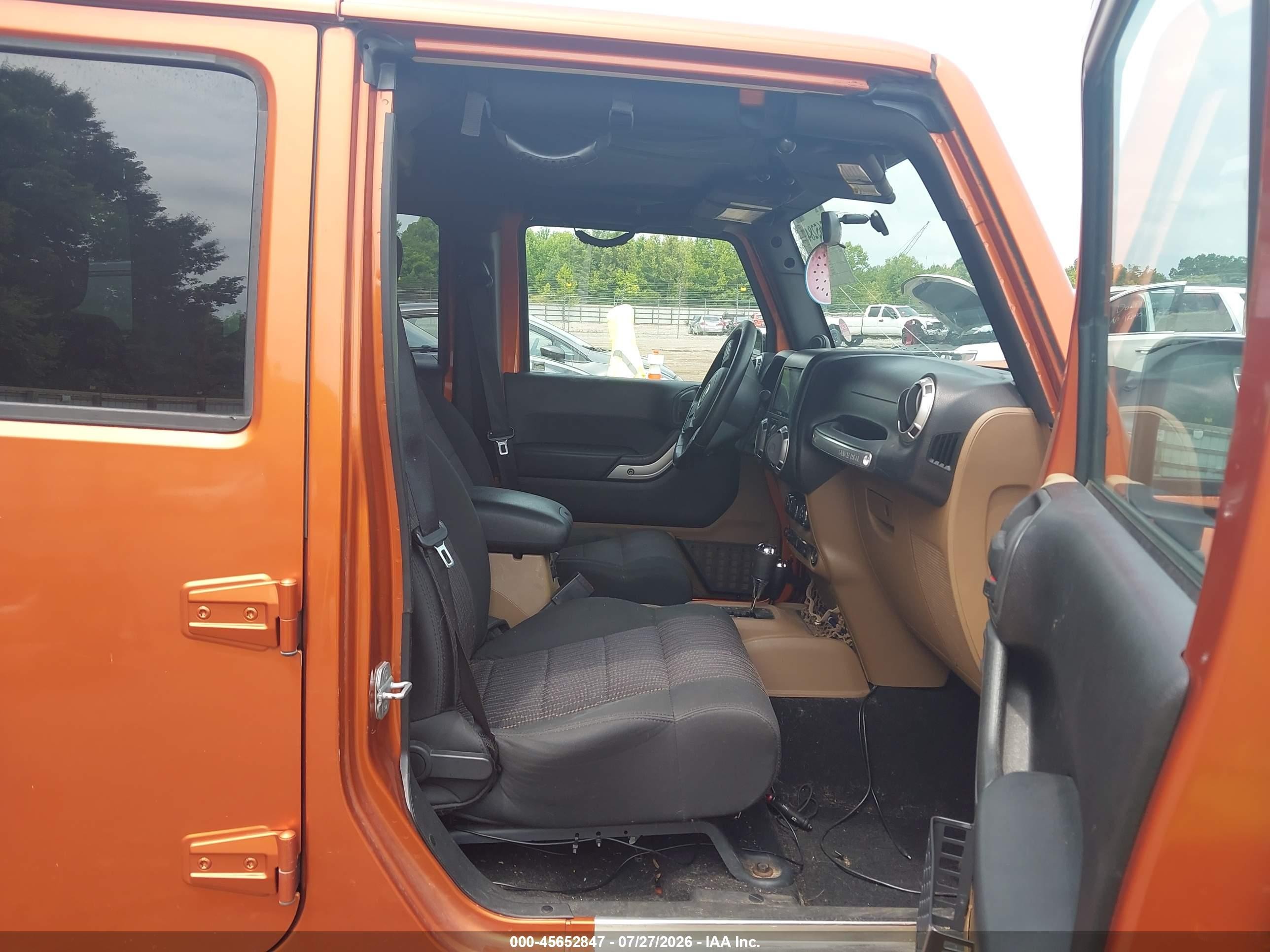 2011 Jeep Wrangler Unlimited Sahara Orange vin: 1J4BA5H12BL528537
