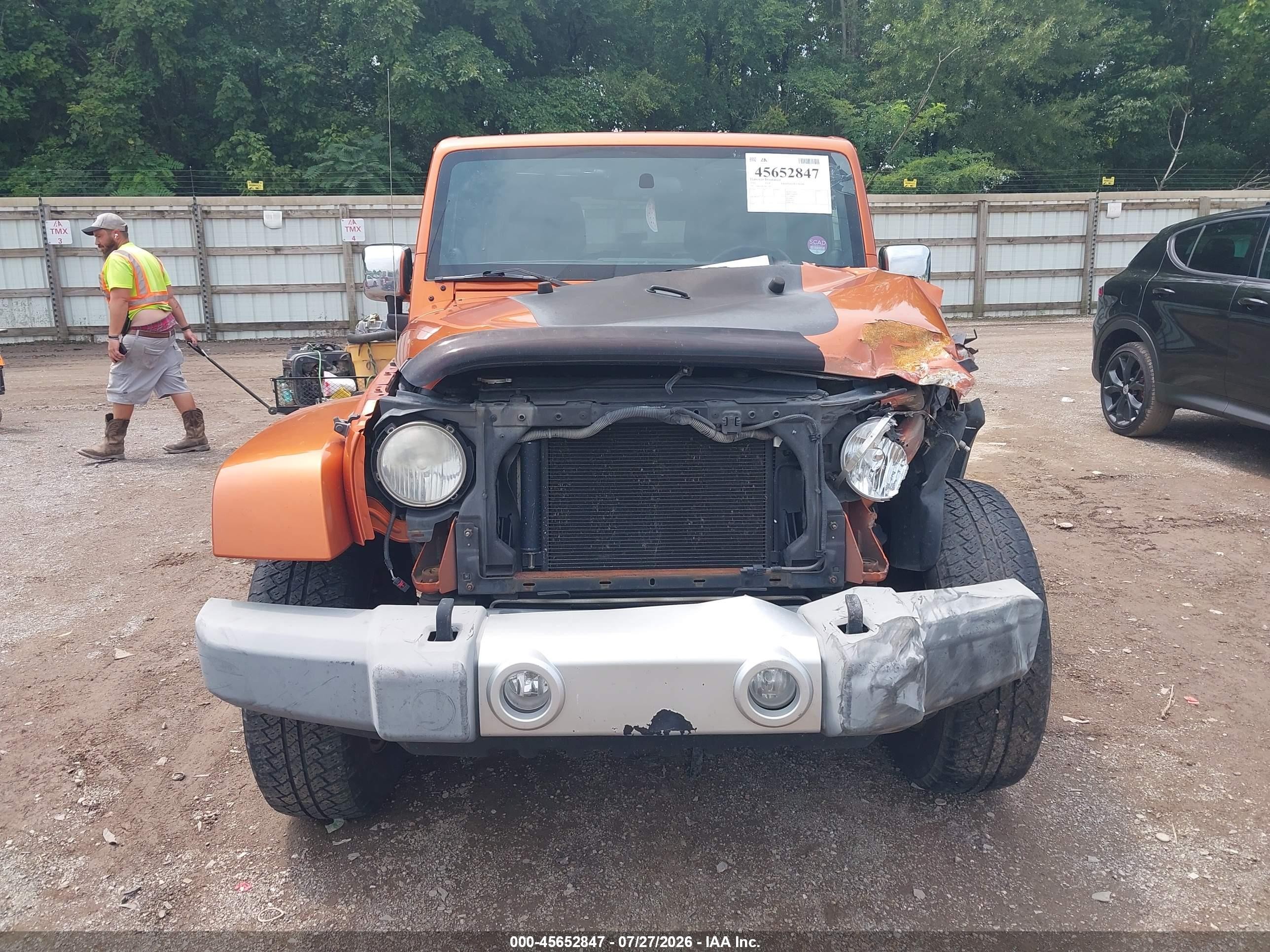 2011 Jeep Wrangler Unlimited Sahara Orange vin: 1J4BA5H12BL528537