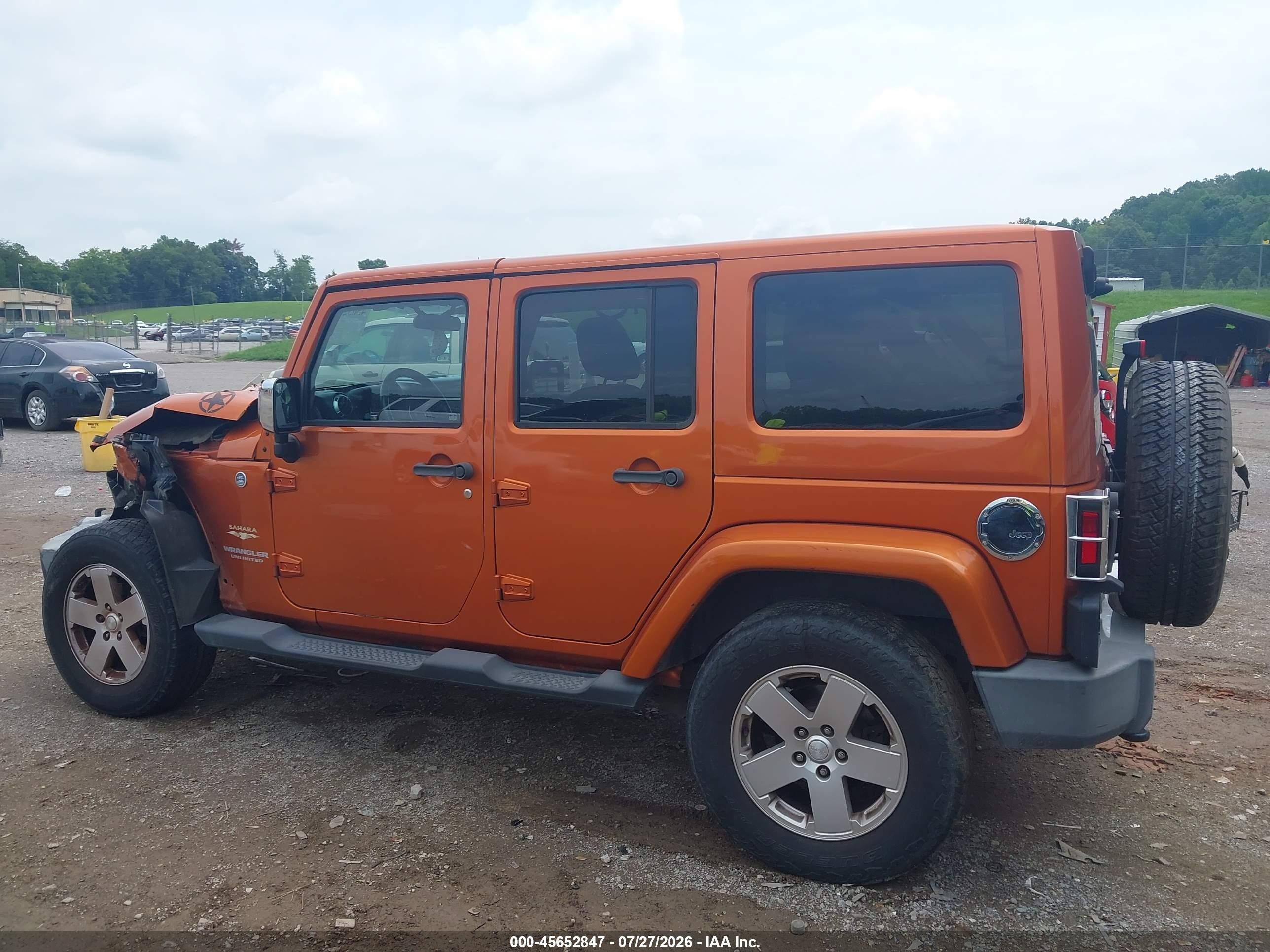 2011 Jeep Wrangler Unlimited Sahara Orange vin: 1J4BA5H12BL528537