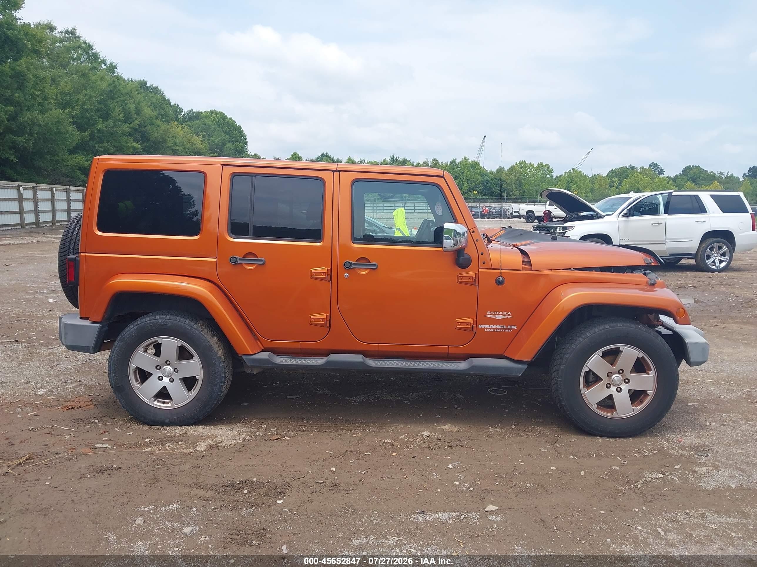 2011 Jeep Wrangler Unlimited Sahara Orange vin: 1J4BA5H12BL528537