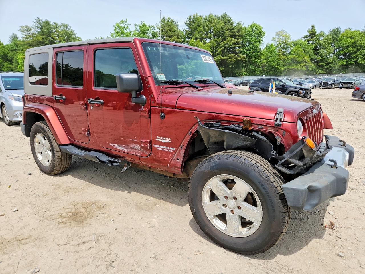 2010 Jeep Wrangler Unlimited Sahara Red vin: 1J4BA5H13AL111071