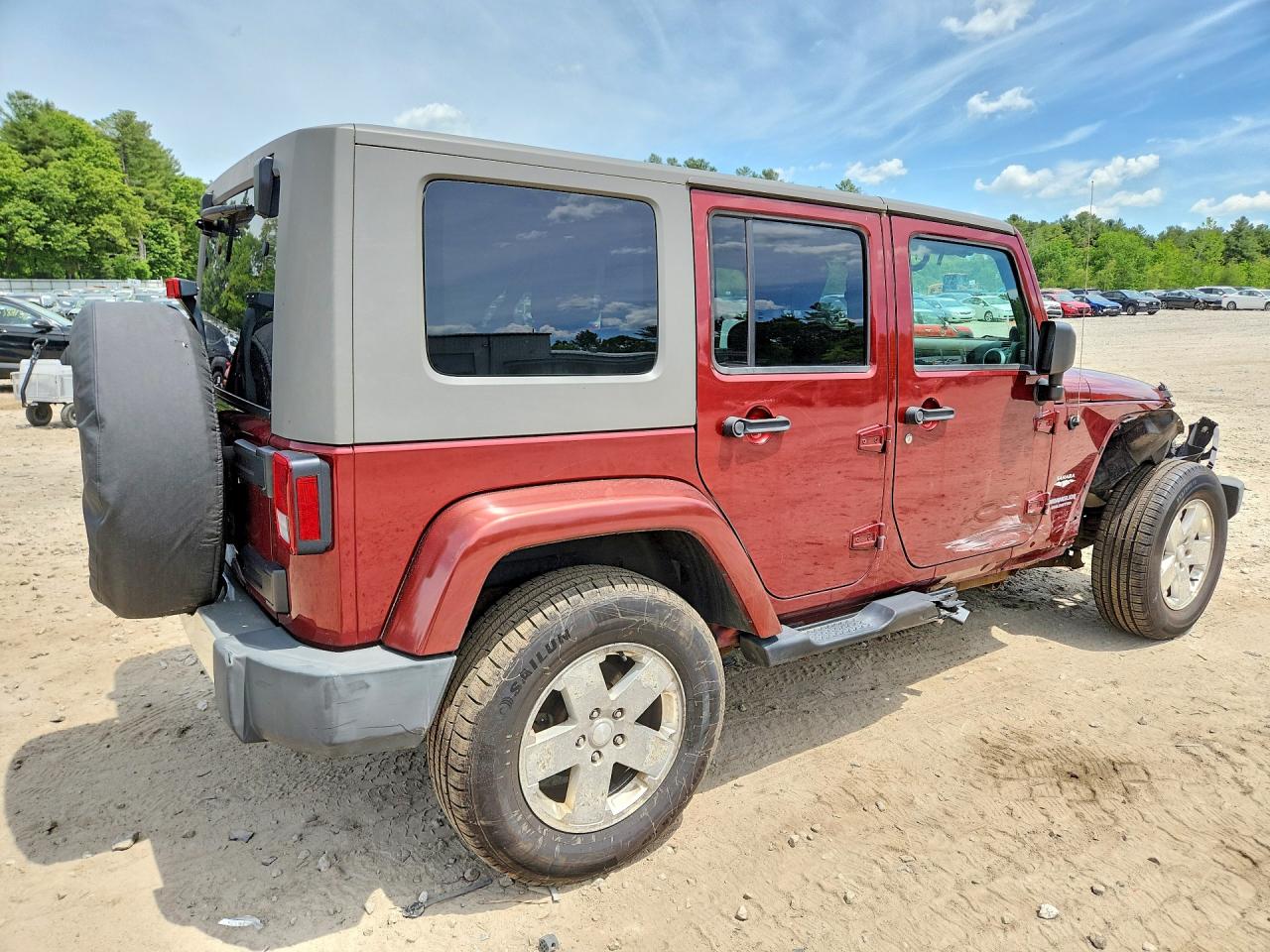 2010 Jeep Wrangler Unlimited Sahara Red vin: 1J4BA5H13AL111071