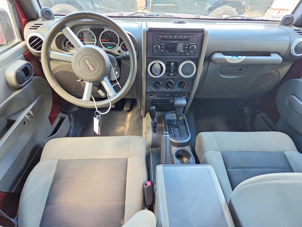 2010 Jeep Wrangler Unlimited Sahara Red vin: 1J4BA5H13AL111071