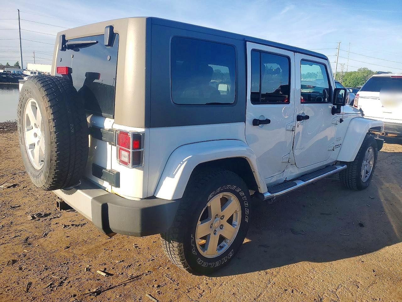 2010 Jeep Wrangler Unlimited Sahara White vin: 1J4BA5H13AL214300