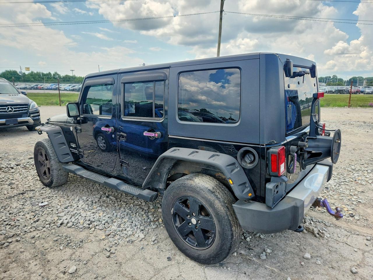 2010 Jeep Wrangler Unlimited Sahara Черный vin: 1J4BA5H13AL224650