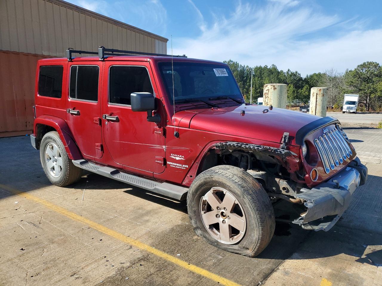 2011 Jeep Wrangler Unlimited Sahara Burgundy vin: 1J4BA5H13BL559005