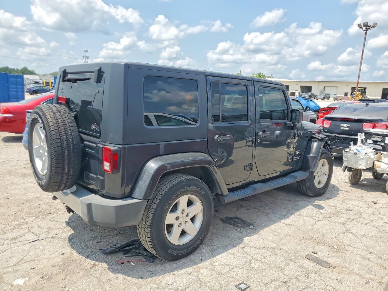 2010 Jeep Wrangler Unlimited Sahara Угольный vin: 1J4BA5H14AL141776